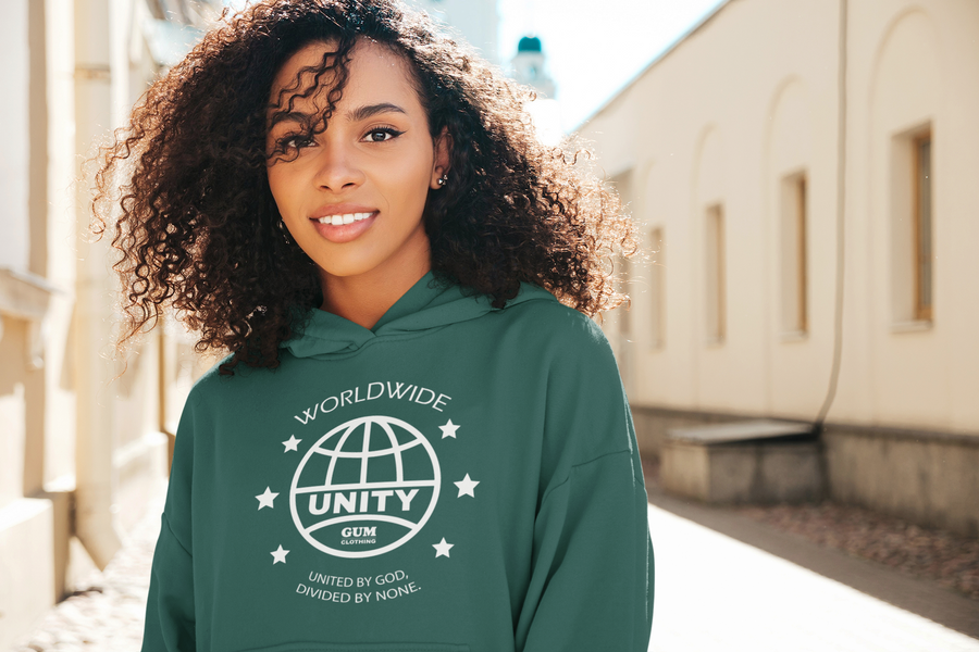 Beautiful Black Woman kinky twist out with green Unity Worldwide hoodie. We Are God's People. Unity
